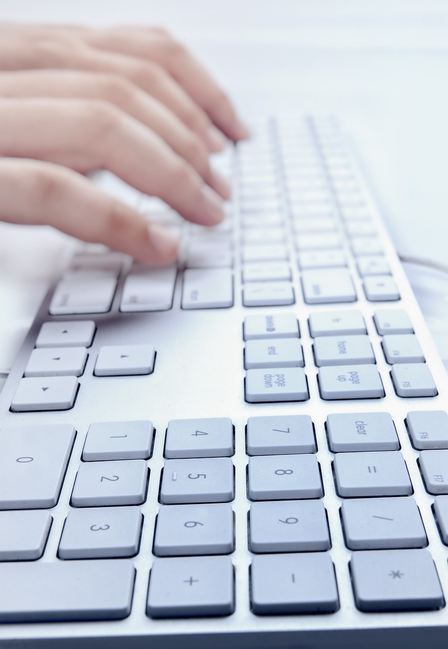 keyboard with fingers typing